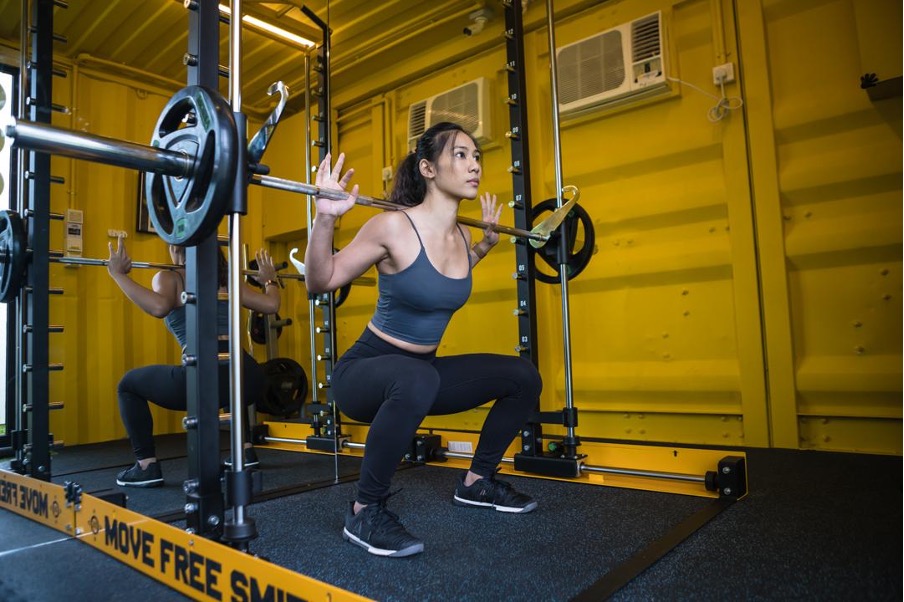 grow your glutes with smith machine squats
